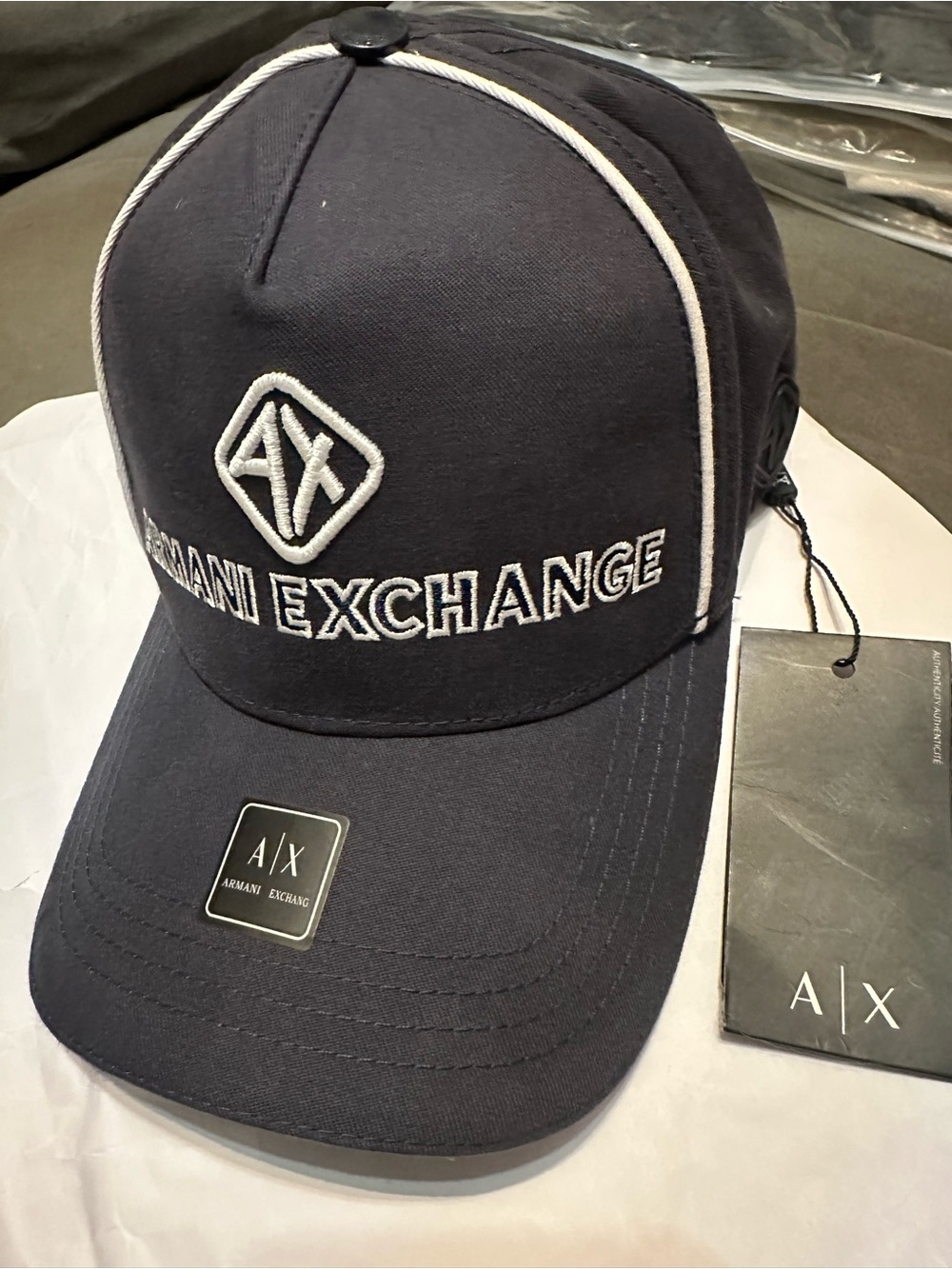 Armani Exchange Black Cap with White Piping and AX Embroidery